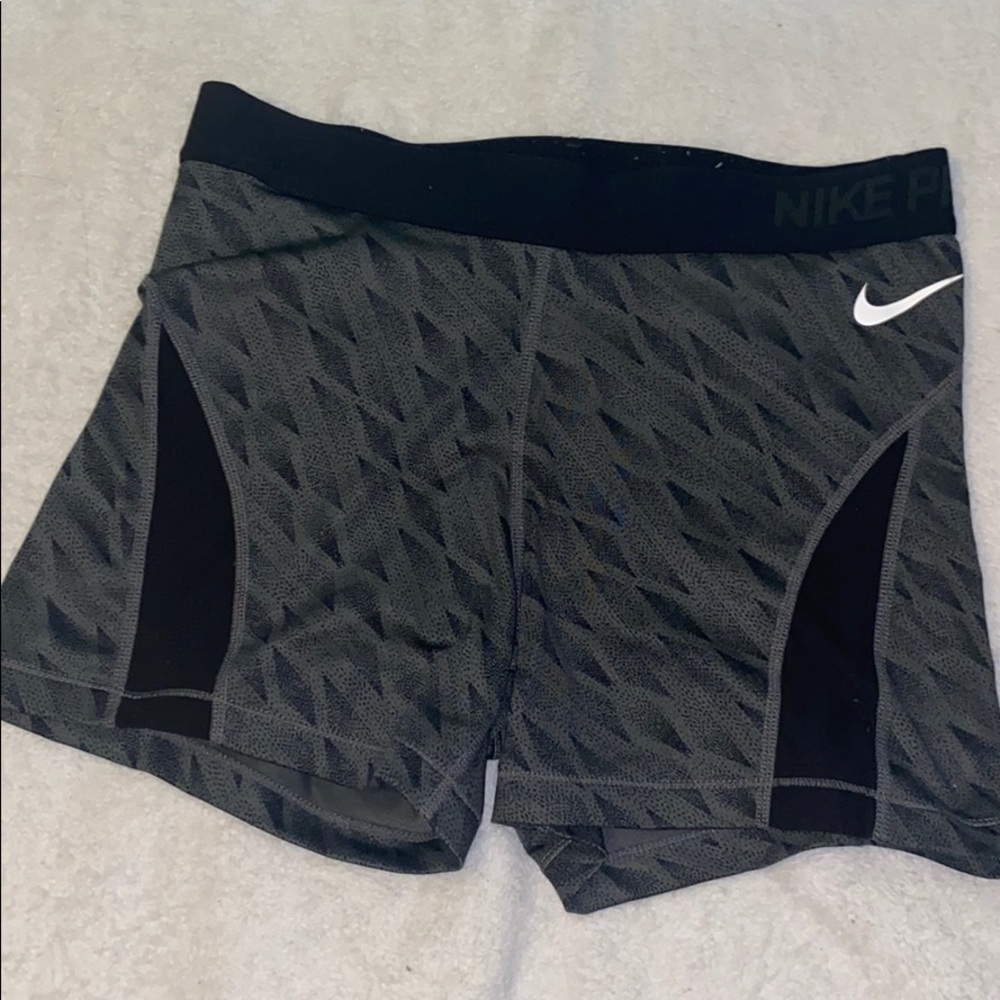 Grey and black nike pros